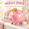 Sparschwein Kinder rosa mit goldener Krone und goldenen Punkten. Niedliche Spardose zum spielerischen Sparen – ideal als Geschenk für Kinder.